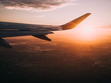 How can travel brands keep customers apprised of border regulations and leisure options?